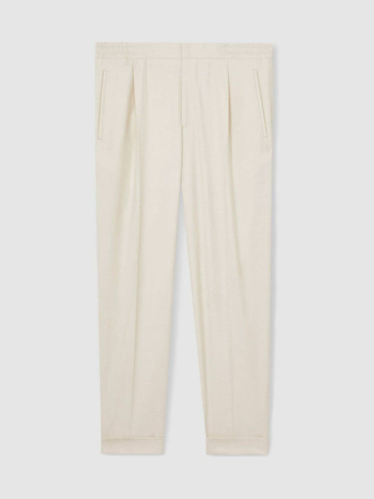 Relaxed-Fit Pleated Tapered Trousers Ecru | Men