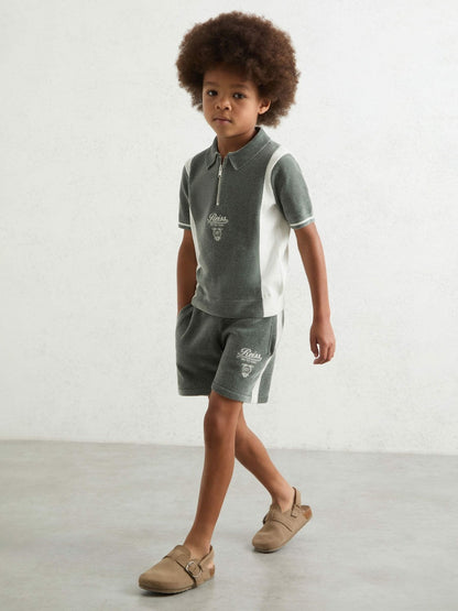 13-14 yrs Chenille Tipped Motor Cars Polo Shirt Dark Sage Green/White | Children & Baby